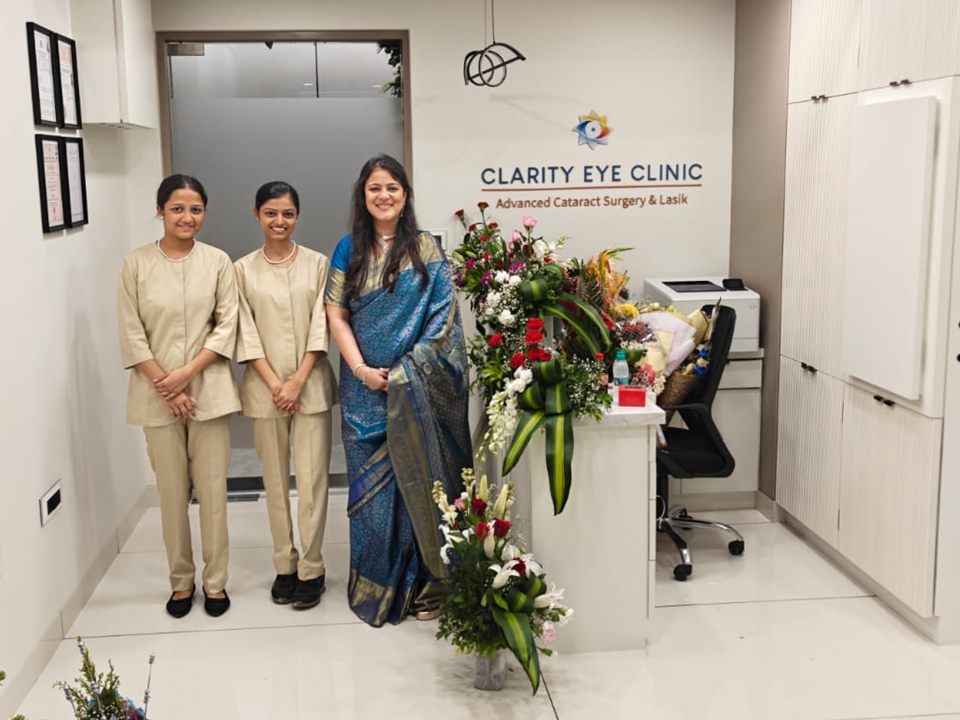 The team at Clarity Eye Clinic standing at the clinic entrance