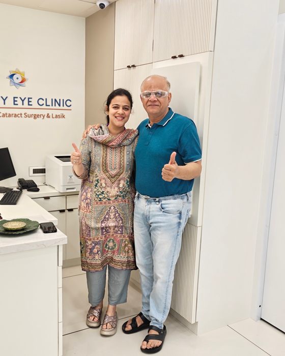 A patient with Dr. Nikita Mashru at Clarity Eye Clinic reception after treatment