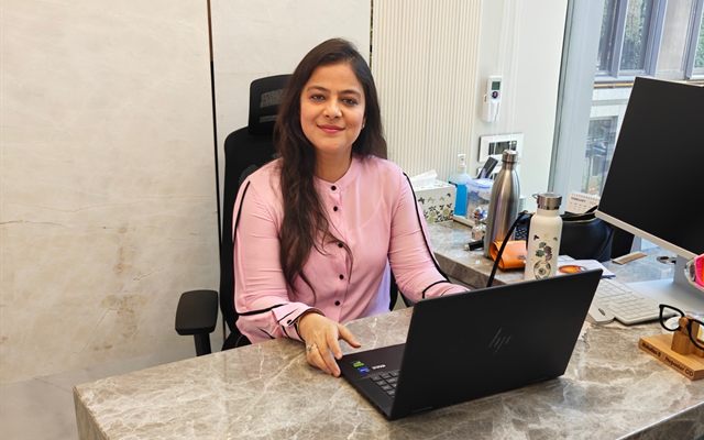 Dr. Nikita Mashru at her consulting desk at Clarity Eye Clinic